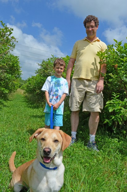 Paul Becker with son logan and dog bo