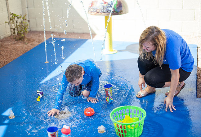 Penn State Behrend alumna Melissa Lichtinger works as online communication manager for Make-A-Wish International but also volunteers for the organization. The first wish she granted was for Lucas, who suffers from lung disease, cerebral palsy and can only communicate through non-verbal expression. A splash pad was installed in his backyard, so he would be able to play safely in water.
